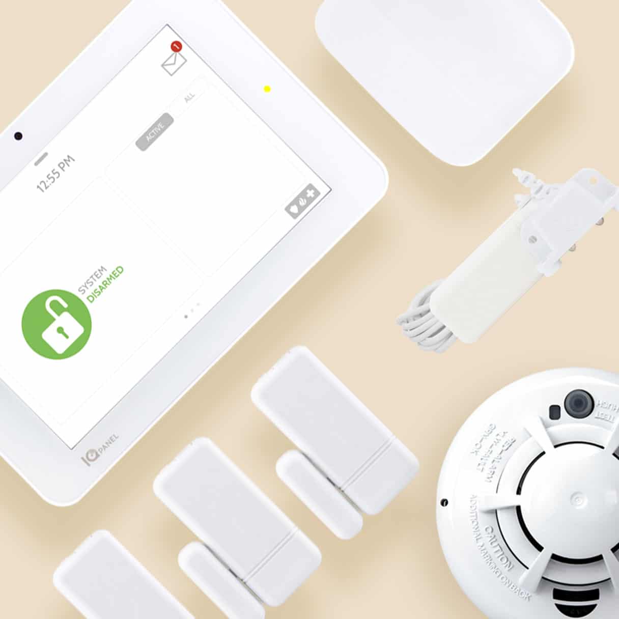BrightSuite's smart hub, window sensors, smoke detector laid out neatly on a table.