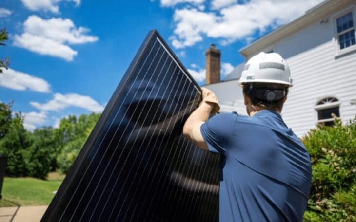 worker with solar panel