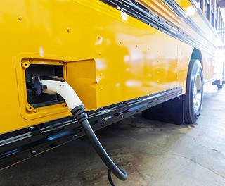 Electric school bus charging