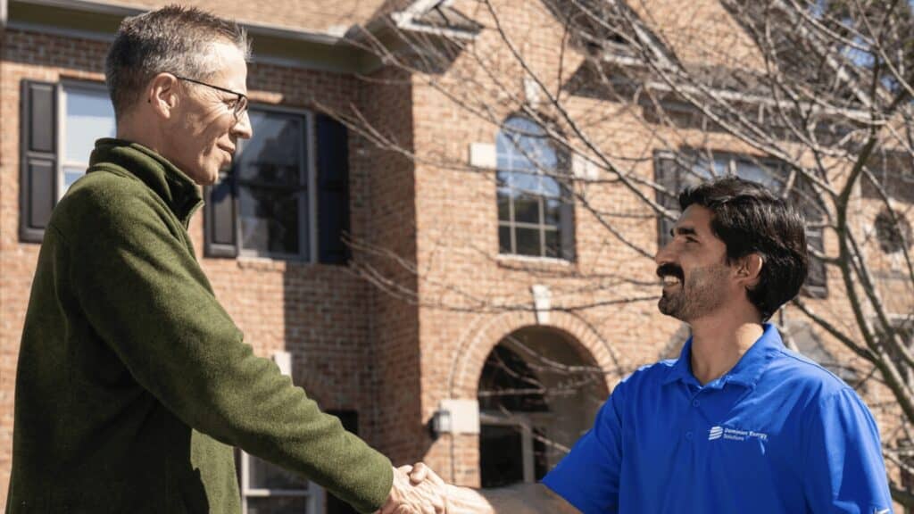 Customer Shaking hands with Energy Advisor Rep